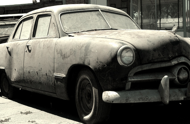 Classic barn find car covered in dust